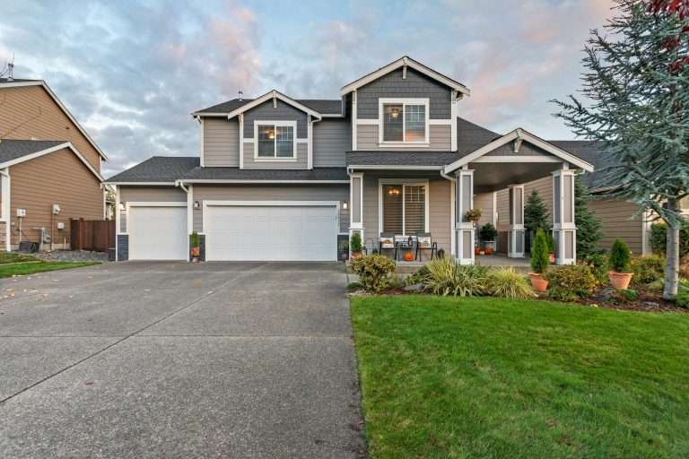 house with lawn and garage